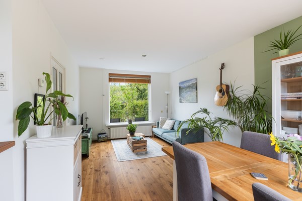 Foto - Te koop: Sfeervolle tussenwoning met groene oase!